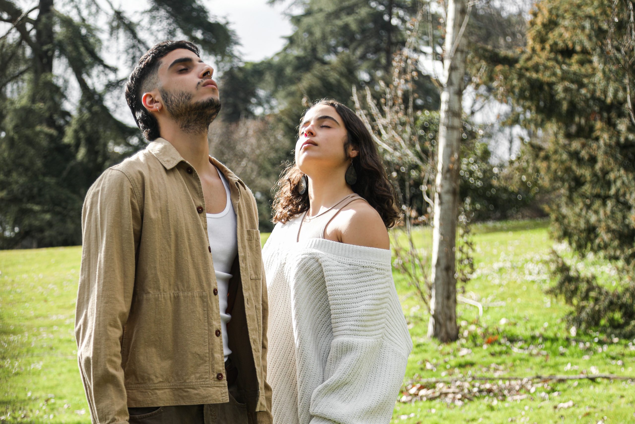 A couple breathing together in a couples breathwork practice